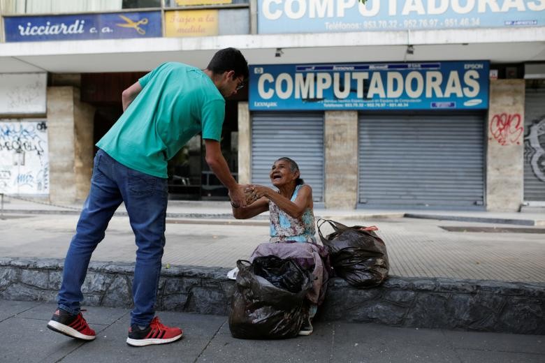 Chum anh bua an tu thien cho dan ngheo Venezuela-Hinh-13