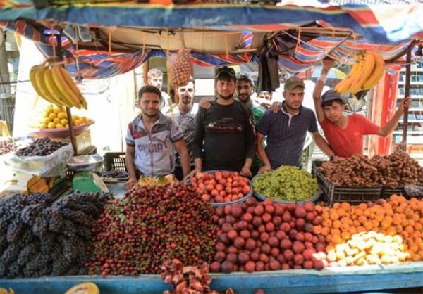 Anh: Nguoi dan Iraq tung bung mua sam o Dong Mosul-Hinh-9