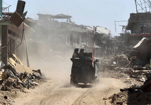 Anh: Quan doi Iraq thoc sau vao khu pho co Mosul-Hinh-2