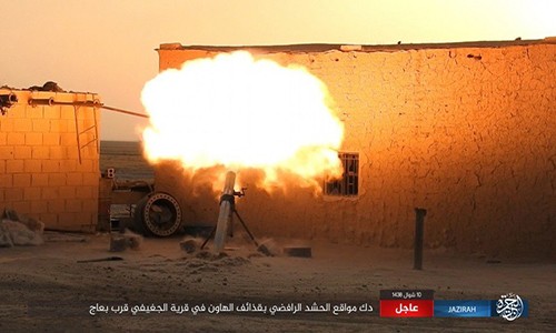 Anh: IS tan cong lieu chet can cu Iraq gan bien gioi Syria-Hinh-5