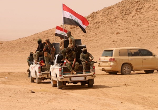 Anh: Iraq giai phong vung trong yeu gan bien gioi voi Syria-Hinh-3