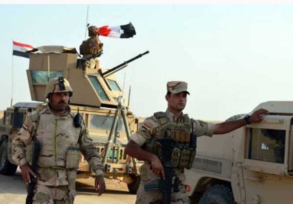 Anh: Iraq giai phong vung trong yeu gan bien gioi voi Syria-Hinh-5