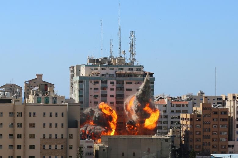 Can canh toa nha dat van phong AP o Gaza bi Israel san phang-Hinh-4