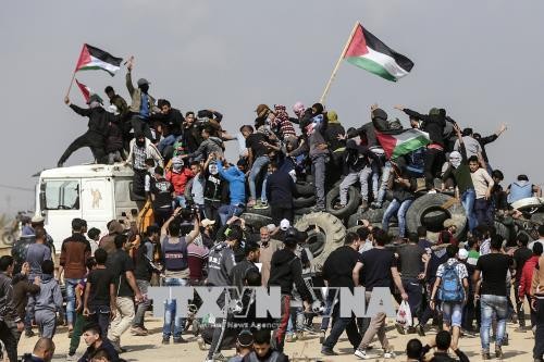 Dung do giua nguoi bieu tinh Palestine va binh linh Israel