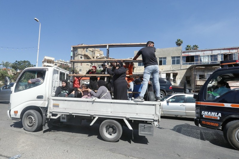 Canh nguoi dan Lebanon un un so tan vi don oanh kich cua Israel-Hinh-9