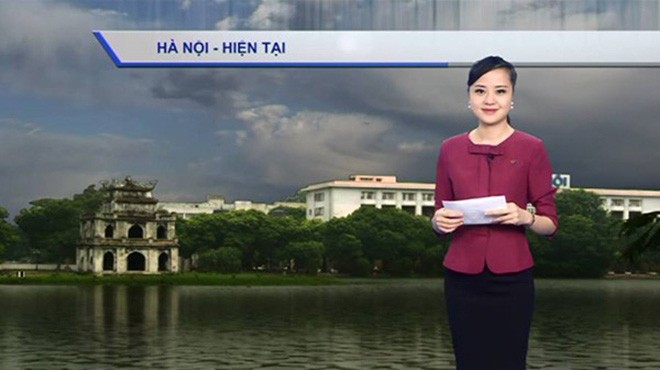 Nu MC VTV dung cam dan thoi tiet duoi mua bao gio ra sao?-Hinh-2