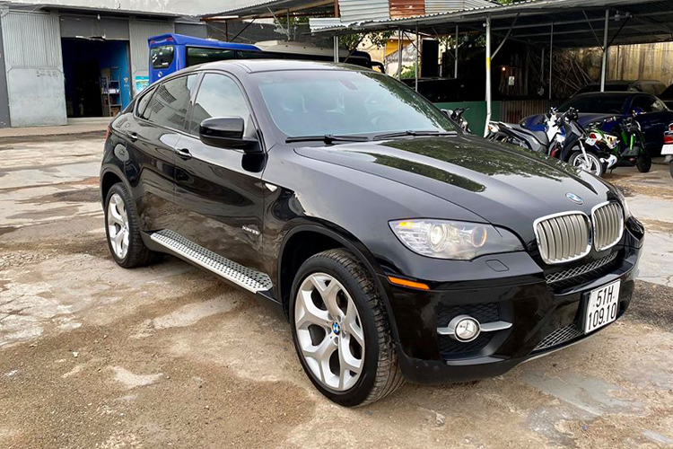 BMW X6 dung 12 nam, ban 700 trieu - 