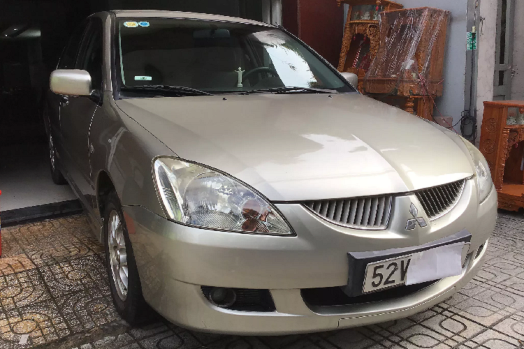 Xe Mitsubishi Lancer chay 17 nam, ban 180 trieu o Sai Gon-Hinh-8