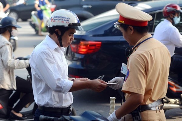 Bao hiem oto, xe may bat buoc tu thang 3/2021 co gi moi?-Hinh-2