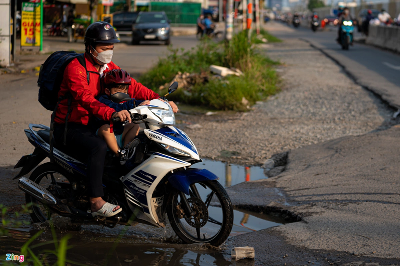 TP HCM: Doan duong hon 2 km sua 4 nam chua xong-Hinh-6