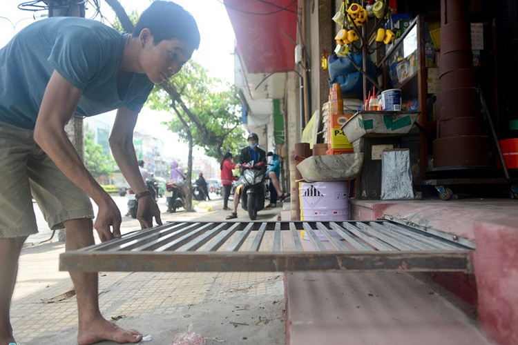 Anh: Cau dat xe banh truong tren via he Sai Gon-Hinh-16