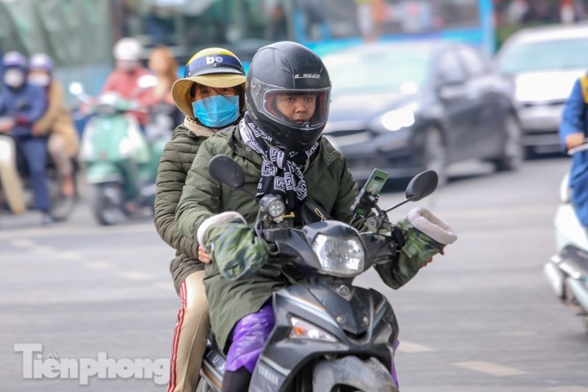 Nhiet do bat ngo xuong thap, nguoi Ha Noi co ro trong gio lanh-Hinh-10