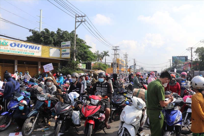 Nguoi ve tu TP HCM, Binh Duong, Dong Nai, Long An phai cach ly the nao?