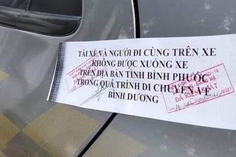 Niem phong cua oto, khong cho xuong xe khi qua Binh Phuoc ve Binh Duong