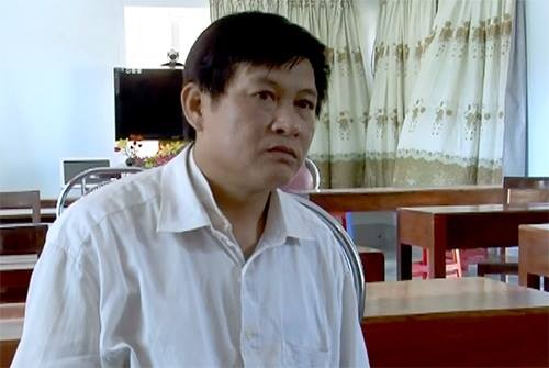 Khoi to vu an Chu tich Hoi nong dan mua ban 8 banh heroin-Hinh-2