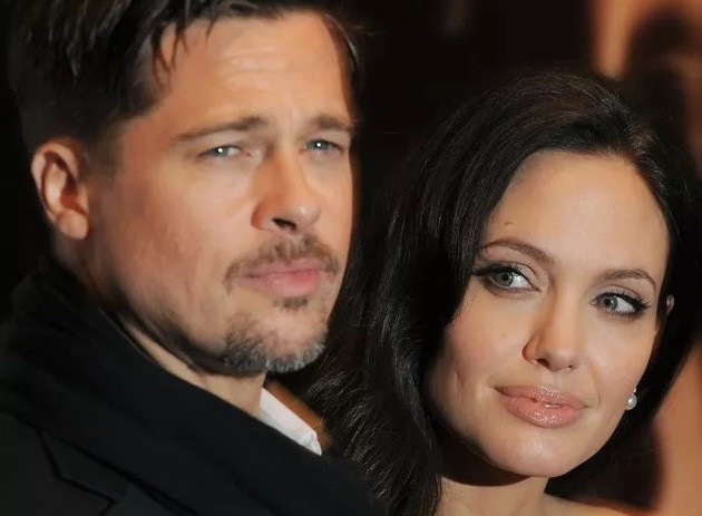 Netizen xon xao anh Angelina Jolie - Brad Pitt o TP.HCM 14 nam truoc-Hinh-10