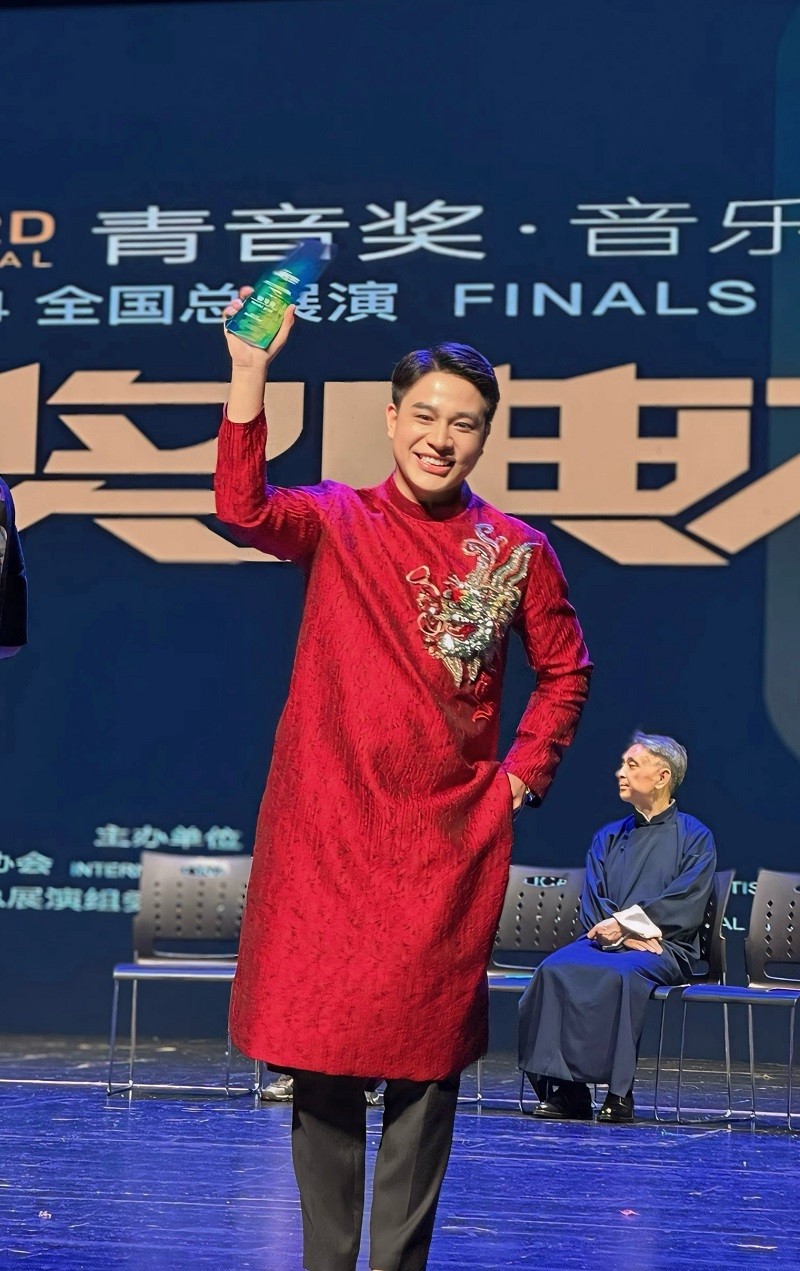 Tran Tung Anh won the music talent competition in China-Picture-3