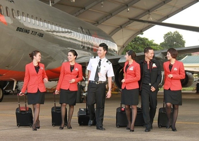 Dong phuc cac hang hang khong Viet thay doi ra sao?-Hinh-9