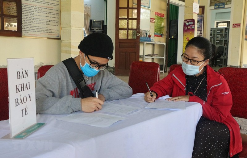 Nguoi dan tro lai Ha Noi sau Tet chu dong khai bao y te o dau?