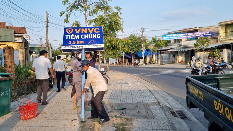 Bien quang cao VNVC Quang Ngai can tro giao thong, phat 5 trieu dong