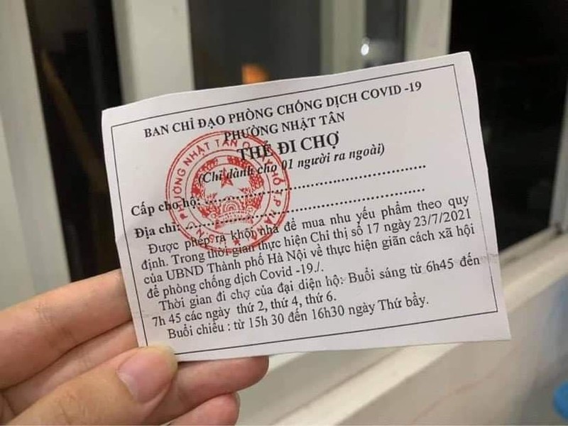 Ha Noi: Nguoi dan o Nhat Tan duoc phat the di cho theo gio