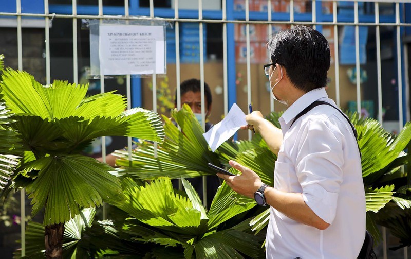 TP.HCM: Phu huynh chay khap noi tim mua sach giao khoa cho con-Hinh-5