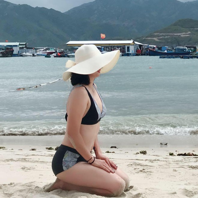 “Hoa khoi bong chuyen” Kim Hue gay bat ngo khi mac suit hay bikini-Hinh-12