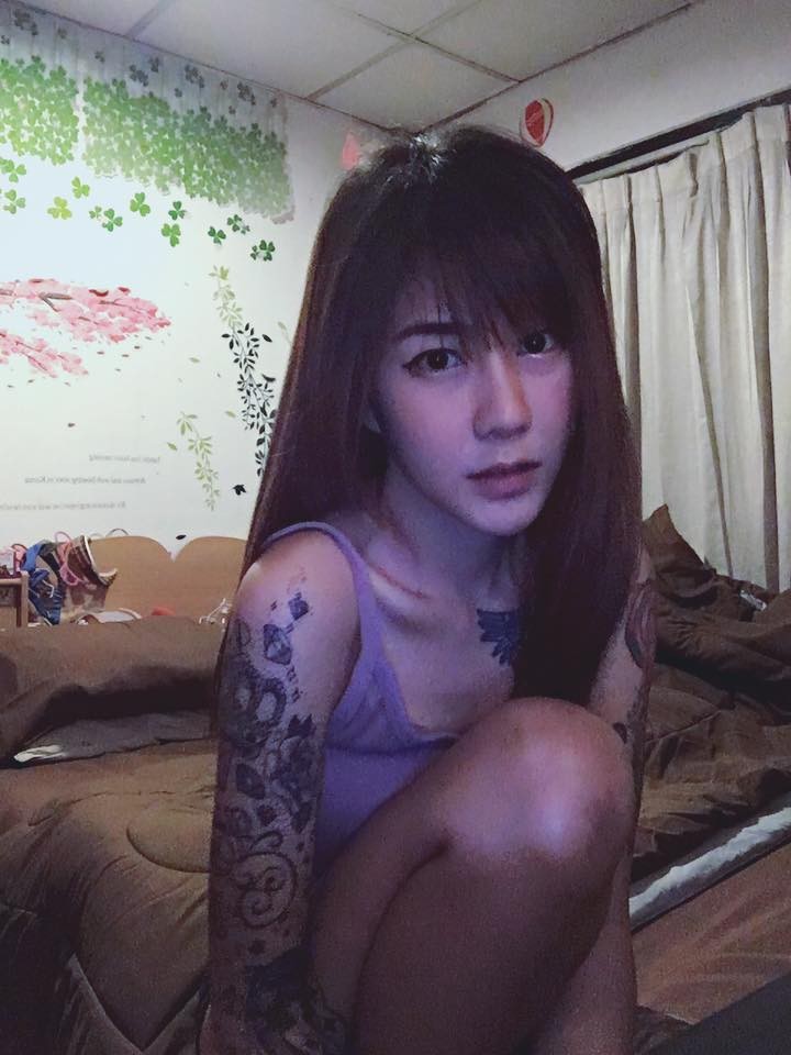 Hot girl Thai mat tre con, than hinh xam 