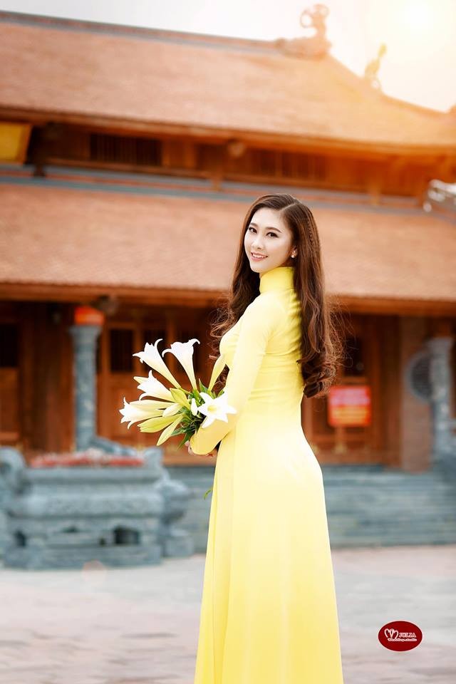 Nguoi dep khoa Thanh nhac hut hon dan mang trong chiec ao dai-Hinh-10