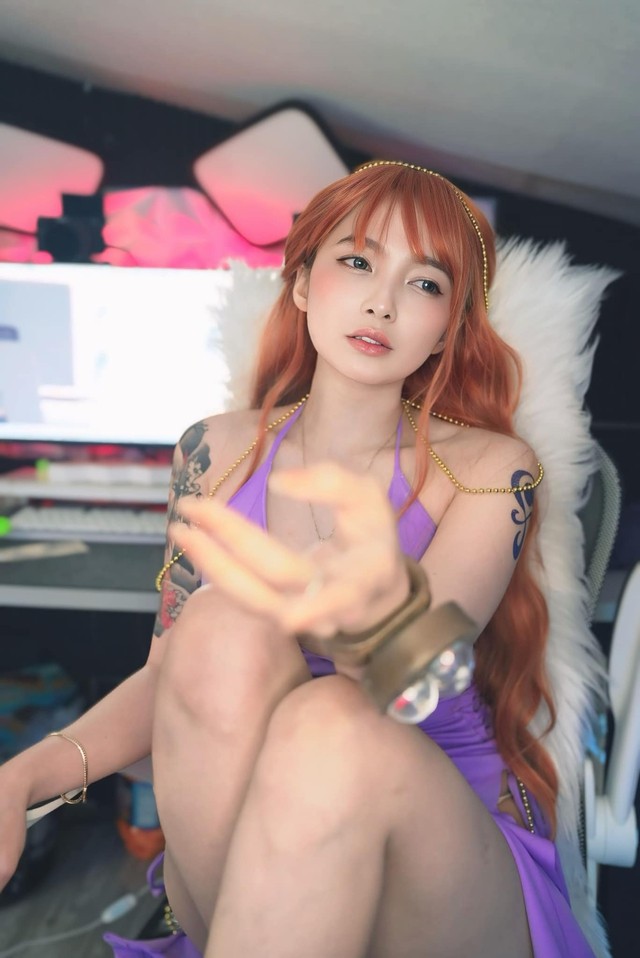 Hot girl Nhat Ban tro tai cosplay Nami, nuot na khong ti vet-Hinh-2