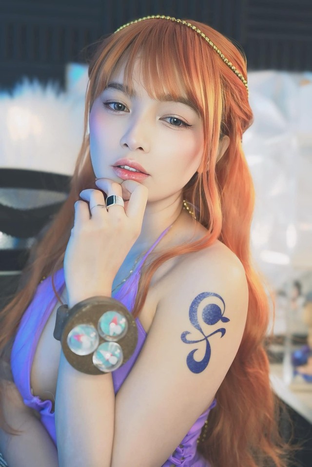 Hot girl Nhat Ban tro tai cosplay Nami, nuot na khong ti vet-Hinh-3