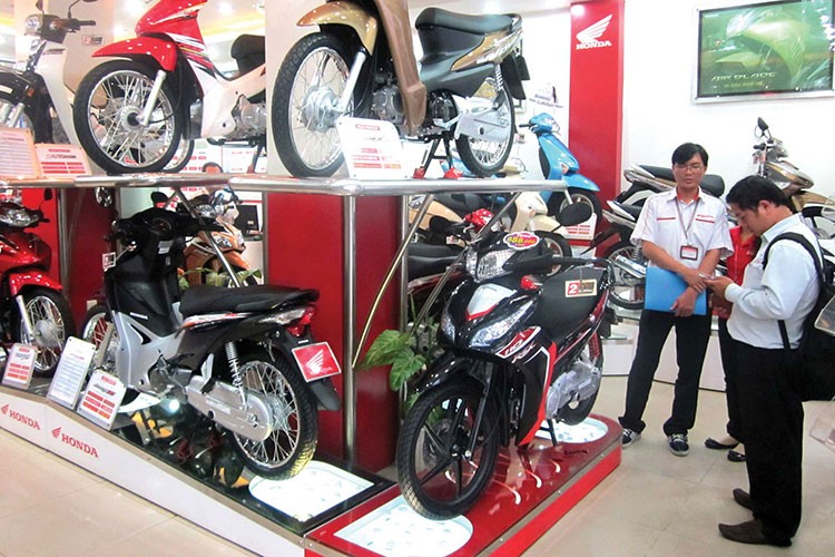 Honda Việt Nam tăng giá hàng loạt xe máy, cao nhất 2 triệu đồng - Hình 2 Honda Viet Nam tang gia hang loat xe may, cao nhat 2 trieu dong-Hinh-2