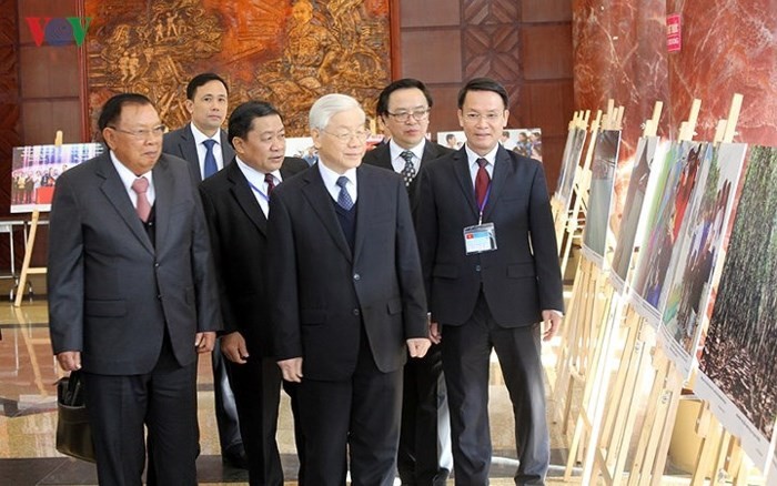 Toàn cảnh chuyến thăm Việt Nam của Tổng Bí thư, Chủ tịch nước Lào - Ảnh 12