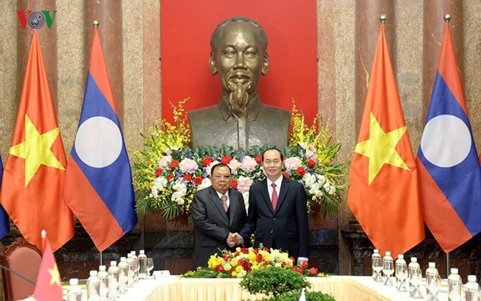 Toàn cảnh chuyến thăm Việt Nam của Tổng Bí thư, Chủ tịch nước Lào - Ảnh 13