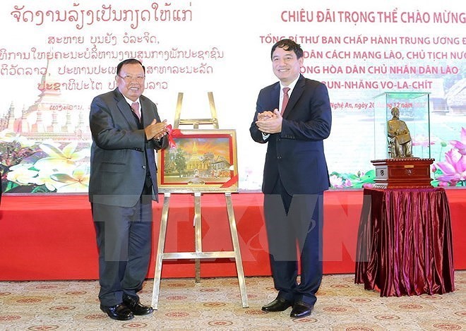 Toàn cảnh chuyến thăm Việt Nam của Tổng Bí thư, Chủ tịch nước Lào - Ảnh 16
