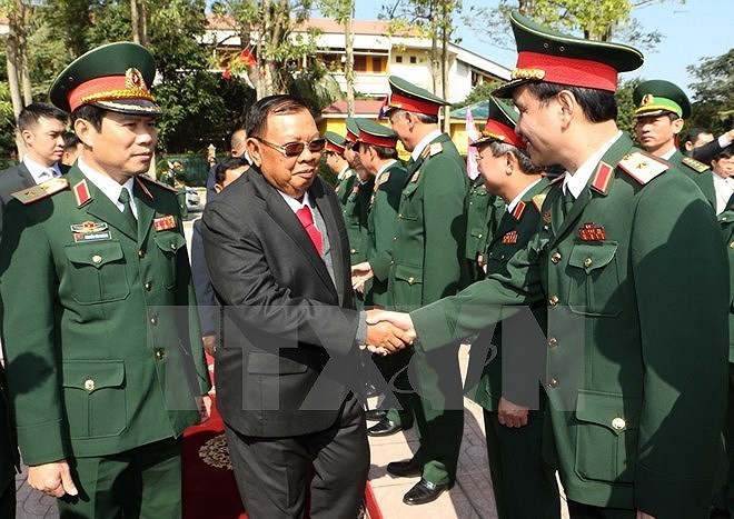 Toàn cảnh chuyến thăm Việt Nam của Tổng Bí thư, Chủ tịch nước Lào - Ảnh 17