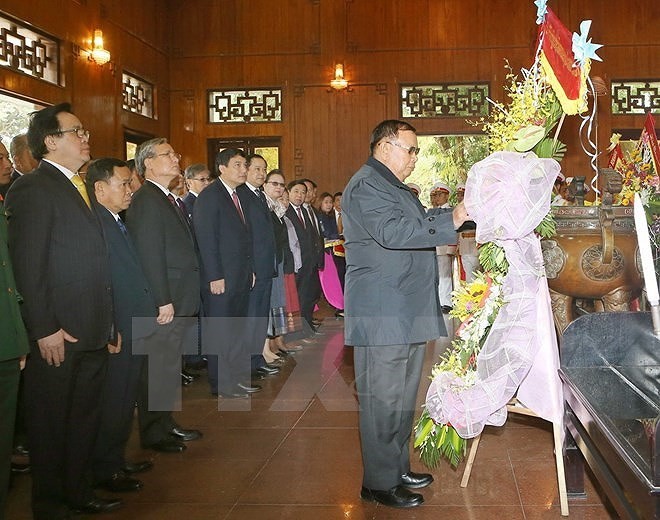 Toàn cảnh chuyến thăm Việt Nam của Tổng Bí thư, Chủ tịch nước Lào - Ảnh 18
