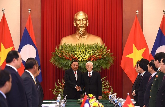 Toàn cảnh chuyến thăm Việt Nam của Tổng Bí thư, Chủ tịch nước Lào - Ảnh 3