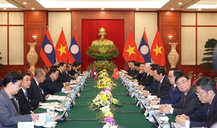 Toàn cảnh chuyến thăm Việt Nam của Tổng Bí thư, Chủ tịch nước Lào - Ảnh 4