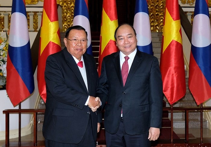 Toàn cảnh chuyến thăm Việt Nam của Tổng Bí thư, Chủ tịch nước Lào - Ảnh 6