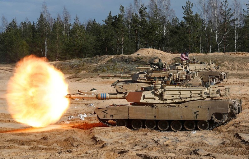 American M1 Abrams battle tanks during a NATO military exercise in Latvia last year.Credit...Ints Kalnins/Reuters