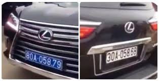 Lo chu nhan o to Lexus mang hai bien xanh - trang tai chua Tam Chuc?