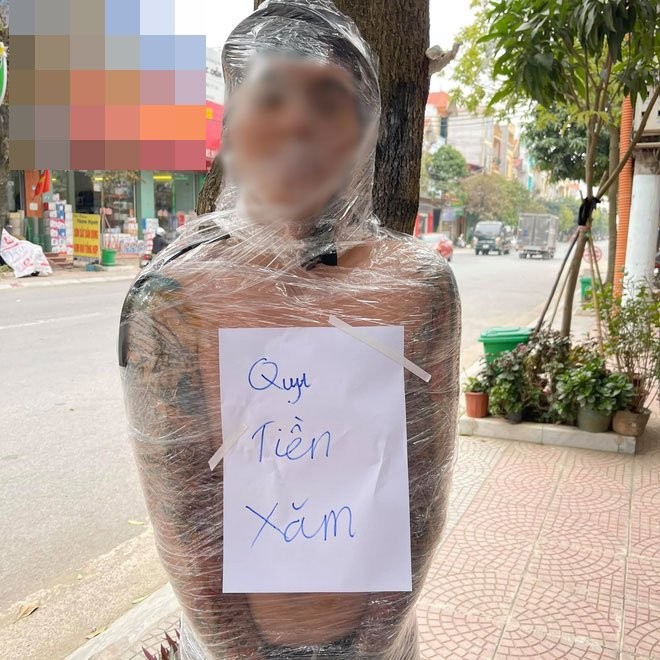 Thanh nien quyt tien xam bi quan bang kin nguoi len bao nuoc ngoai-Hinh-4