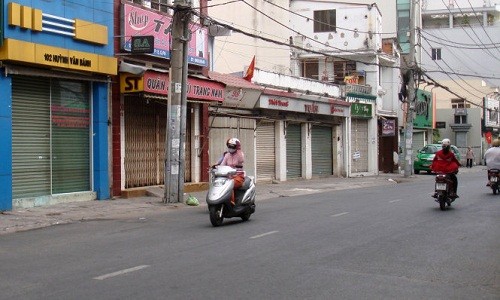 Tai sao nguoi Sai Gon, Ha Noi dong cua mung 1 Tet?