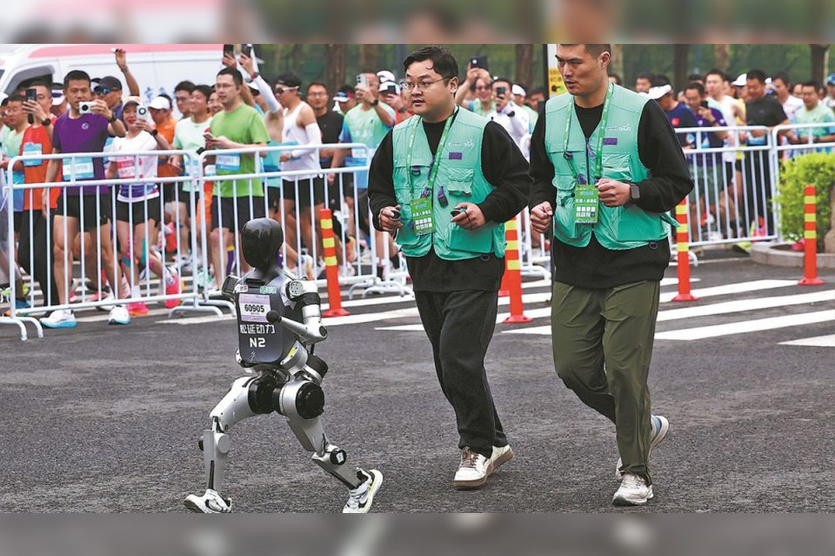 Thu vi hinh anh robot lan dau tien chay dua marathon cung con nguoi-Hinh-12