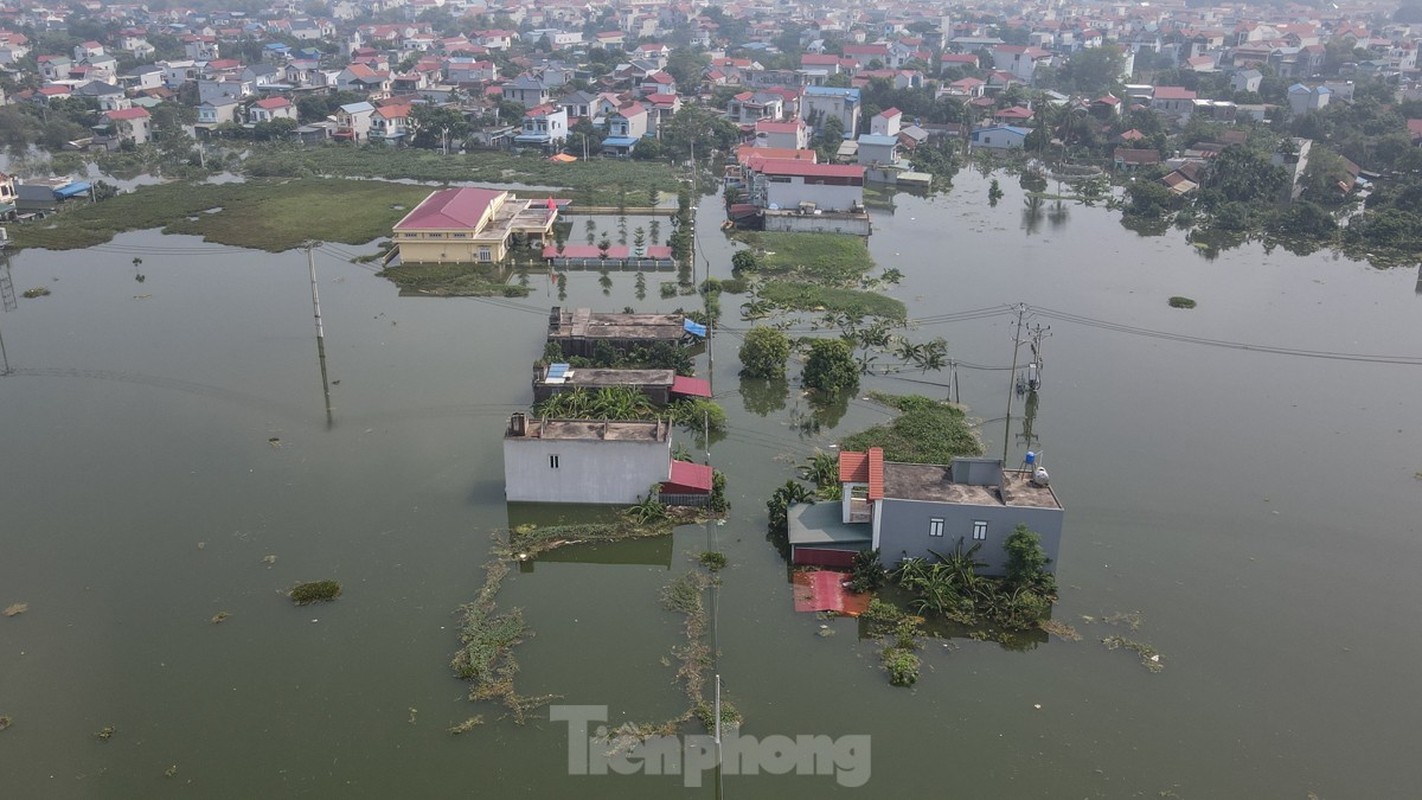 View - 	Hàng trăm ngôi nhà ở Mỹ Đức ngập sâu cuộc sống người dân đảo lộn