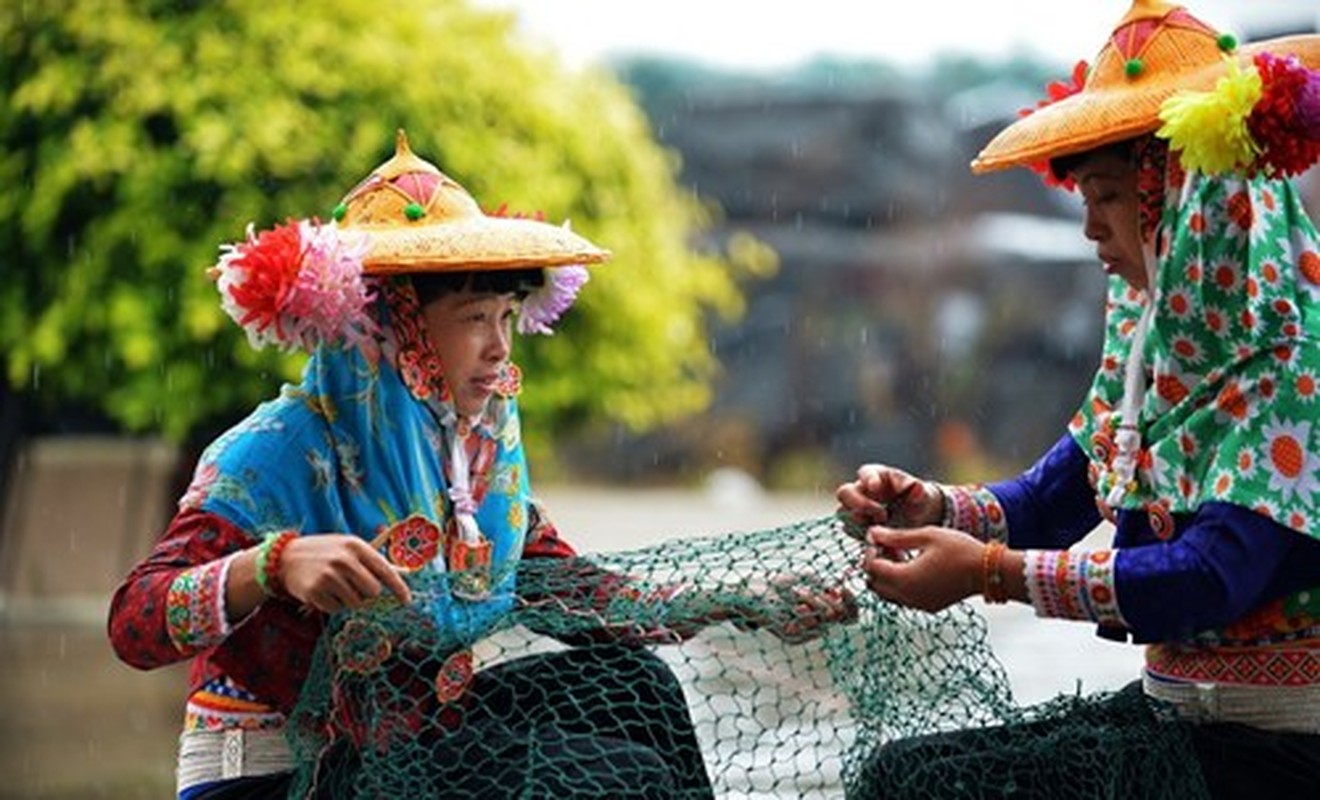 Toc nguoi goc Viet mac trang phuc la o Trung Quoc-Hinh-7