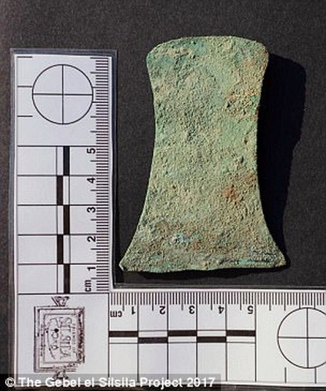 One of the bodies was buried with artifacts including a bronze razor, pictured above