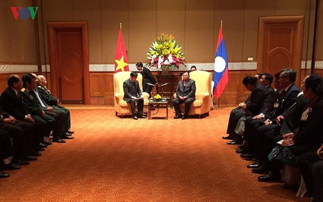 Toàn cảnh chuyến thăm Việt Nam của Tổng Bí thư, Chủ tịch nước Lào - Ảnh 15