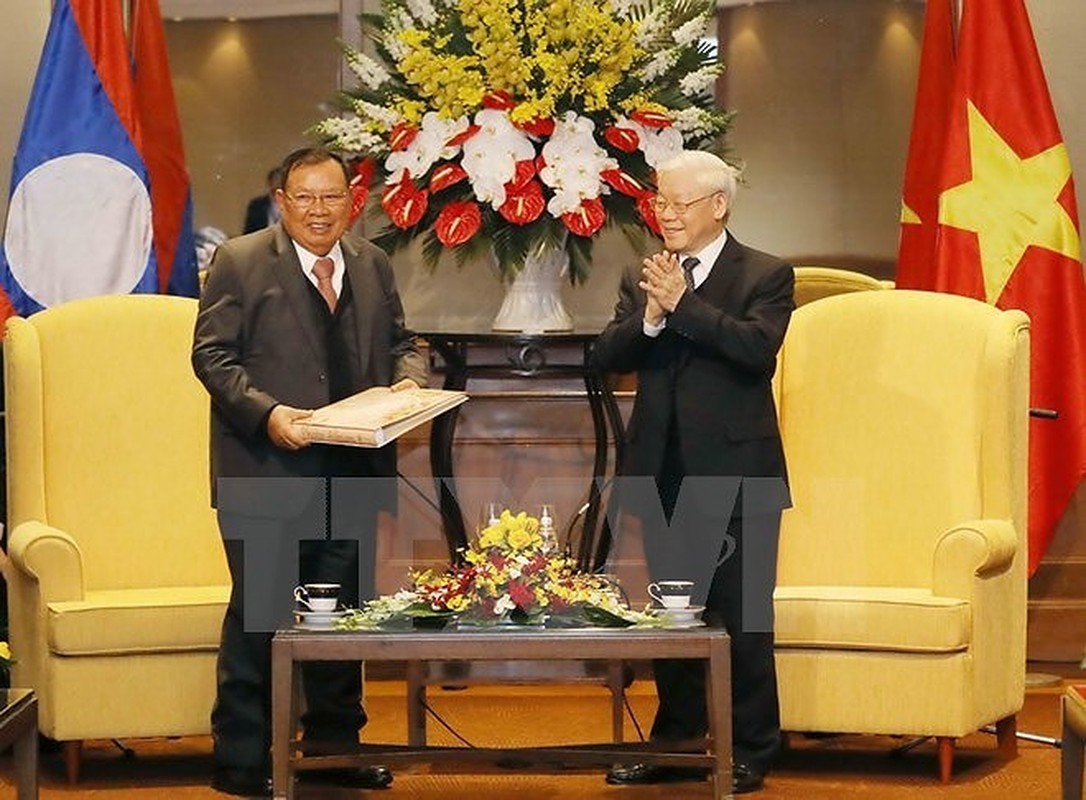 Toàn cảnh chuyến thăm Việt Nam của Tổng Bí thư, Chủ tịch nước Lào - Ảnh 19